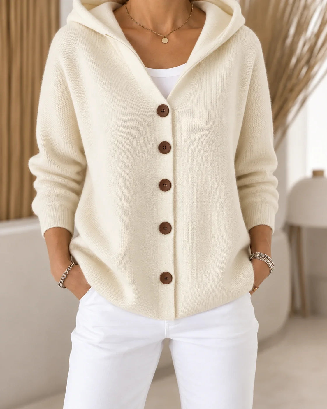 Teri | Licht vest met capuchon en knopen