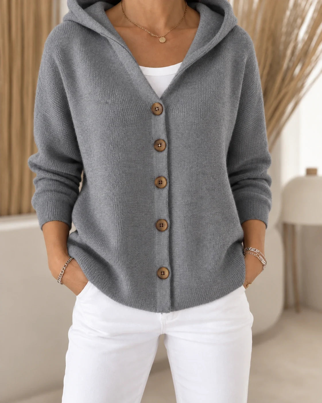 Teri | Licht vest met capuchon en knopen