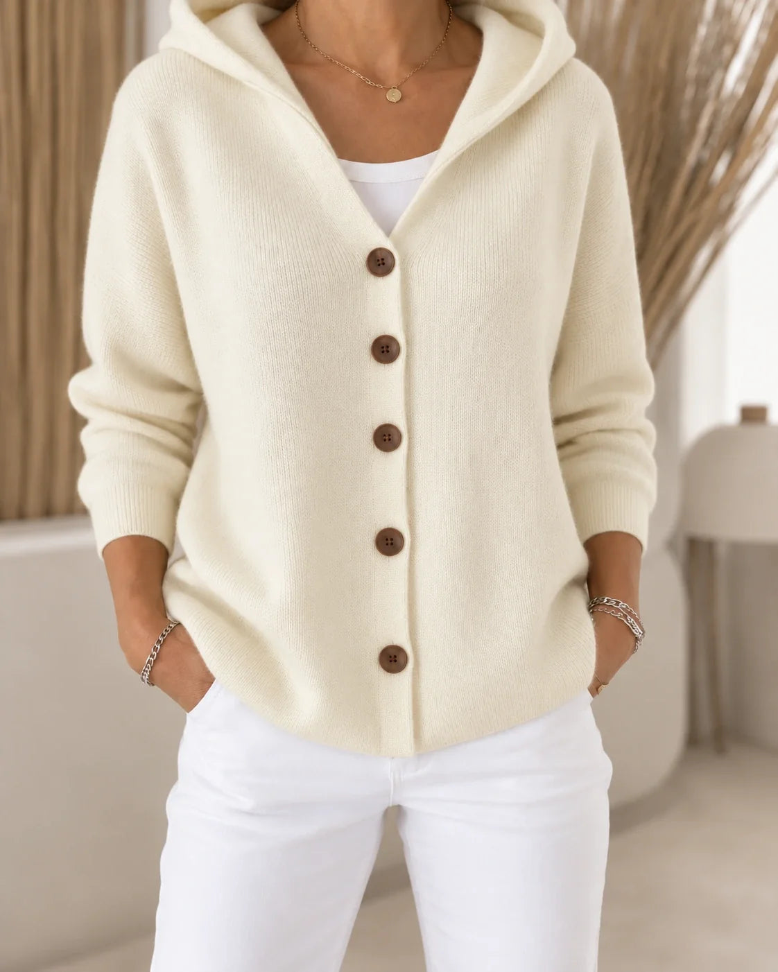 Teri | Licht vest met capuchon en knopen